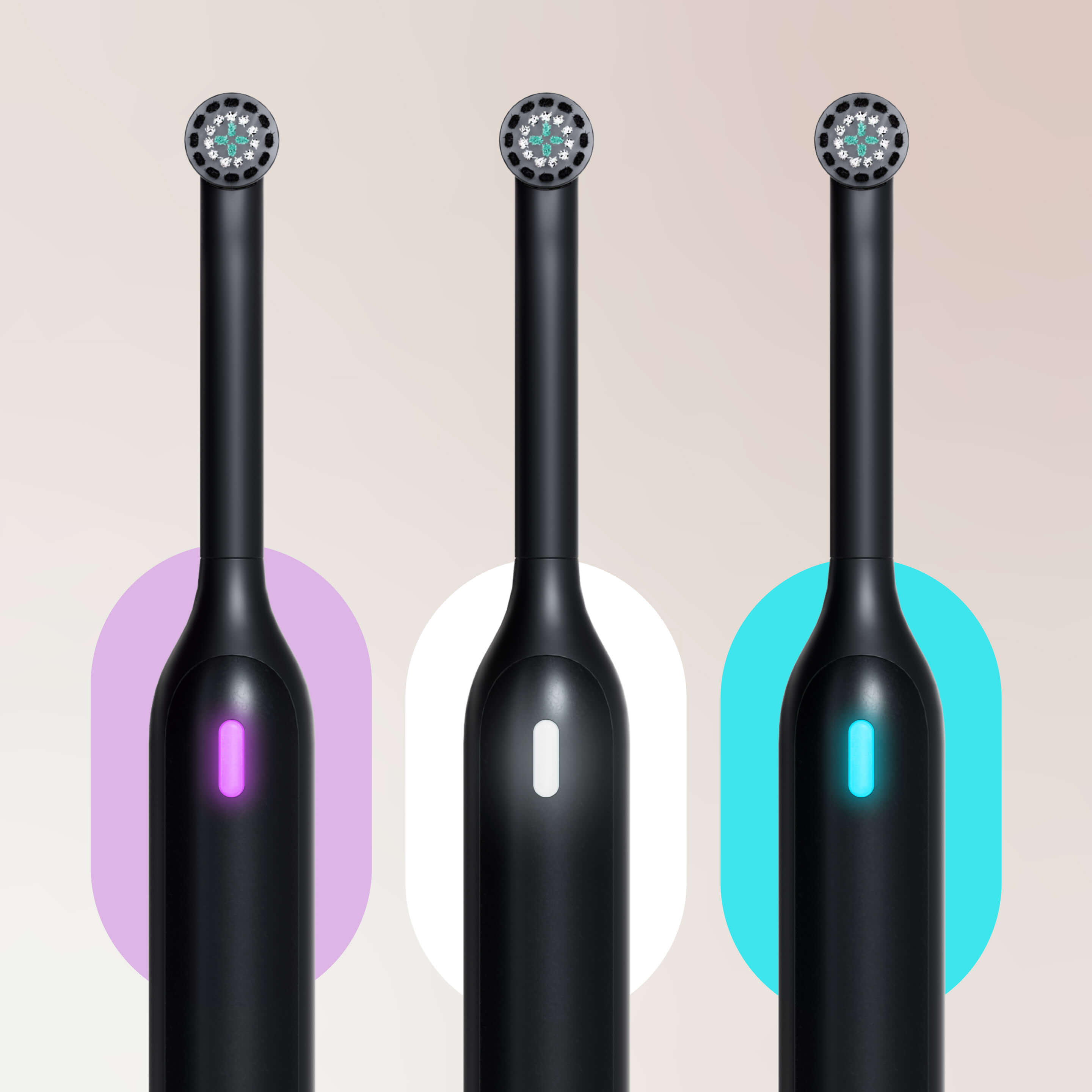 Three black Rev oscillating toothbrushes with illuminated indicators in purple, white, and teal.