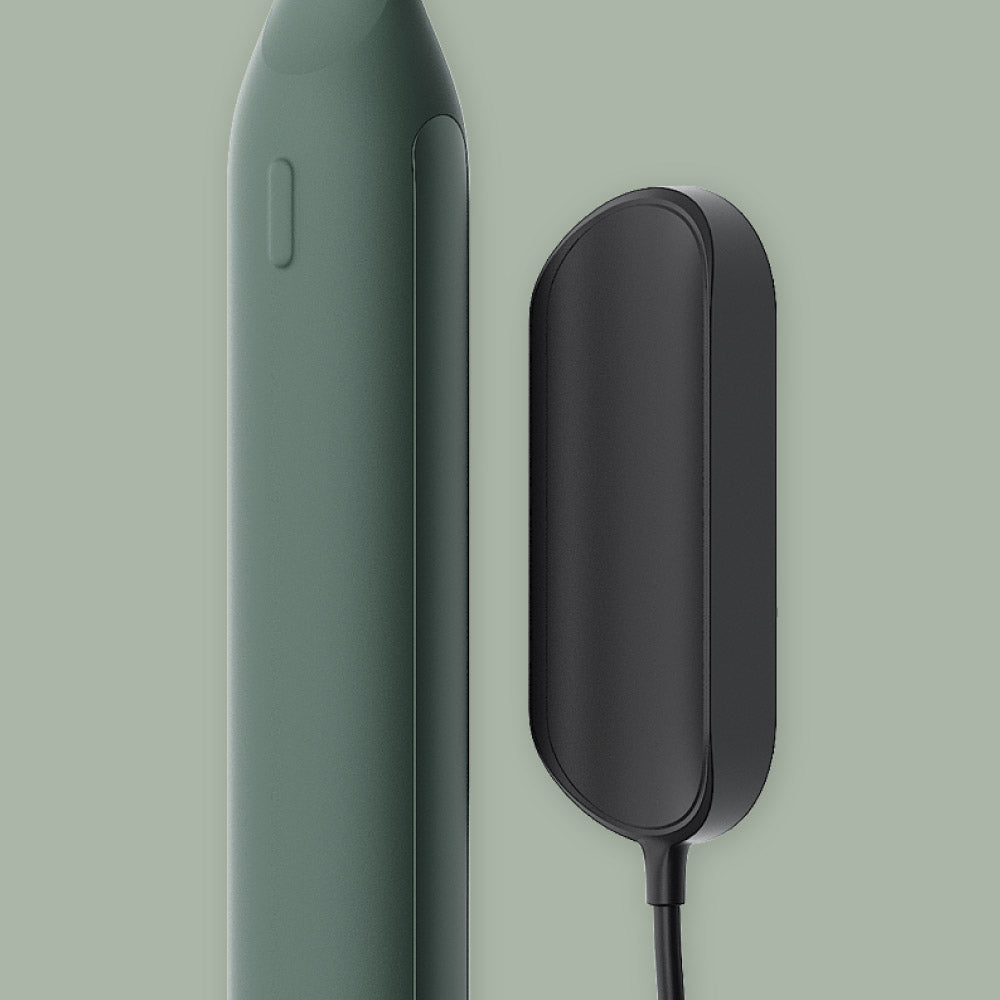 Ultra™ Charger Cable in Moss color beside toothbrush, featuring magnetic charging for full power in 8 hours.