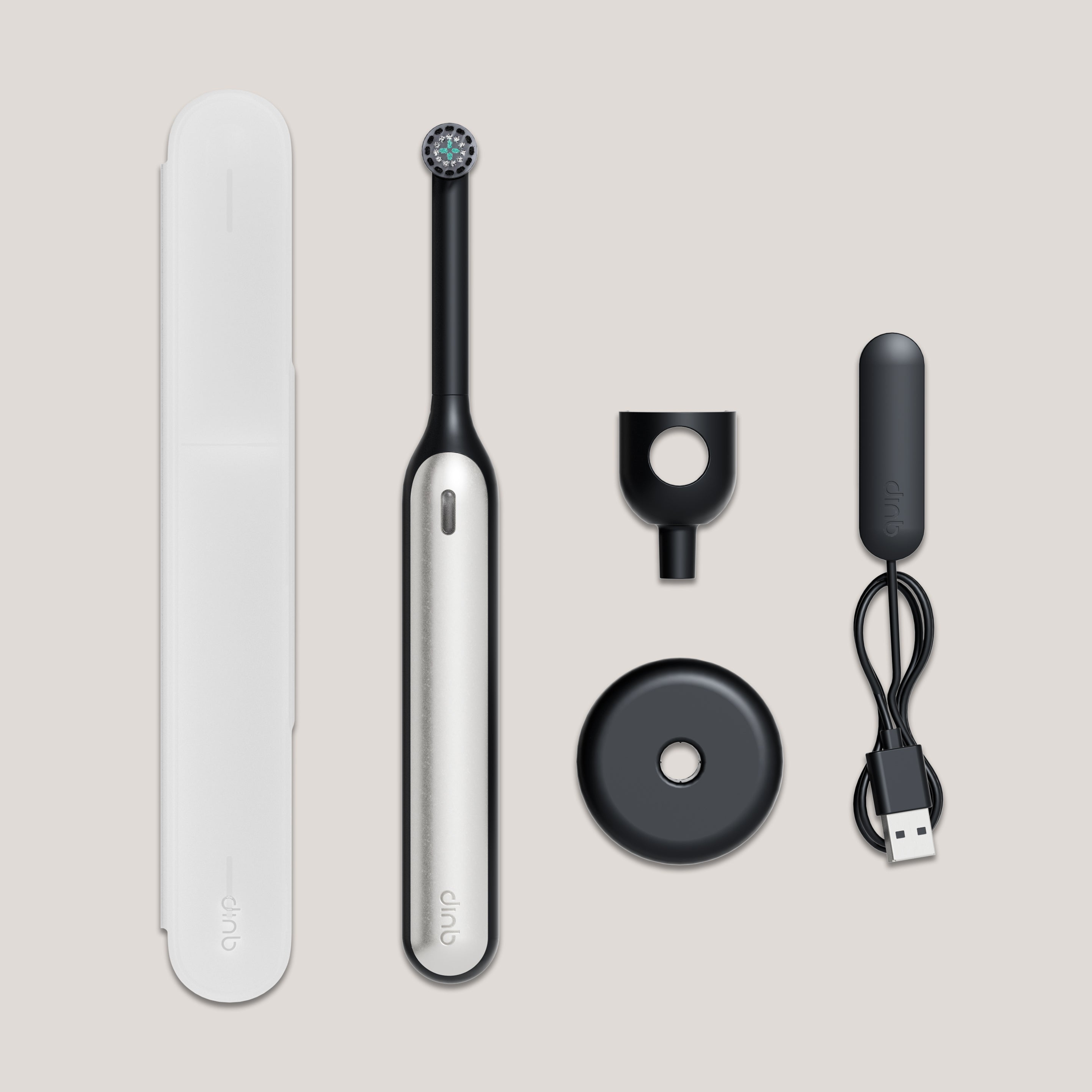 Rev Oscillating Toothbrush in Gray Shadow with its case, mount, charging base, and USB cable.