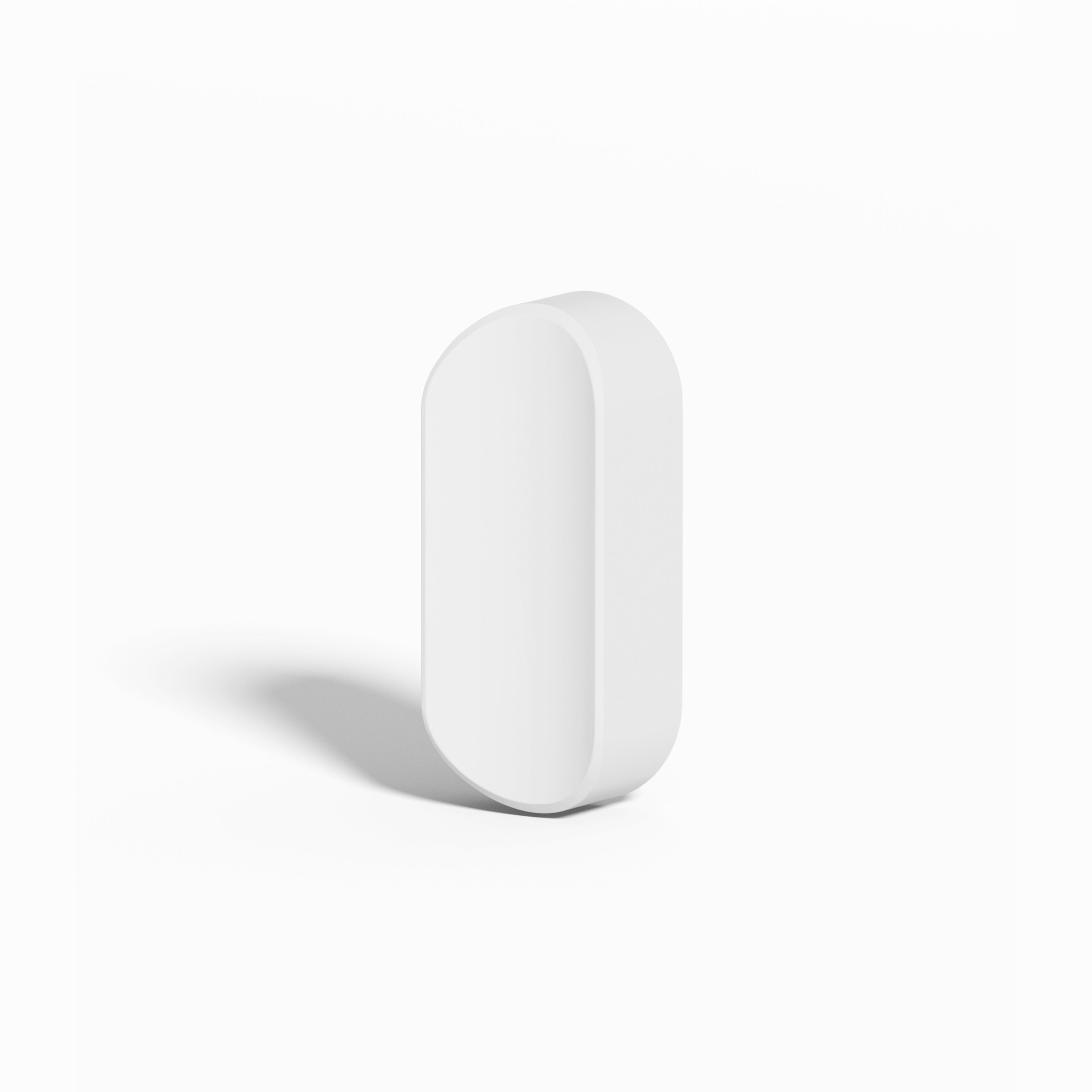 White Rev mirror mount with a smooth, rounded rectangular shape, shown standing upright against a clean white background.