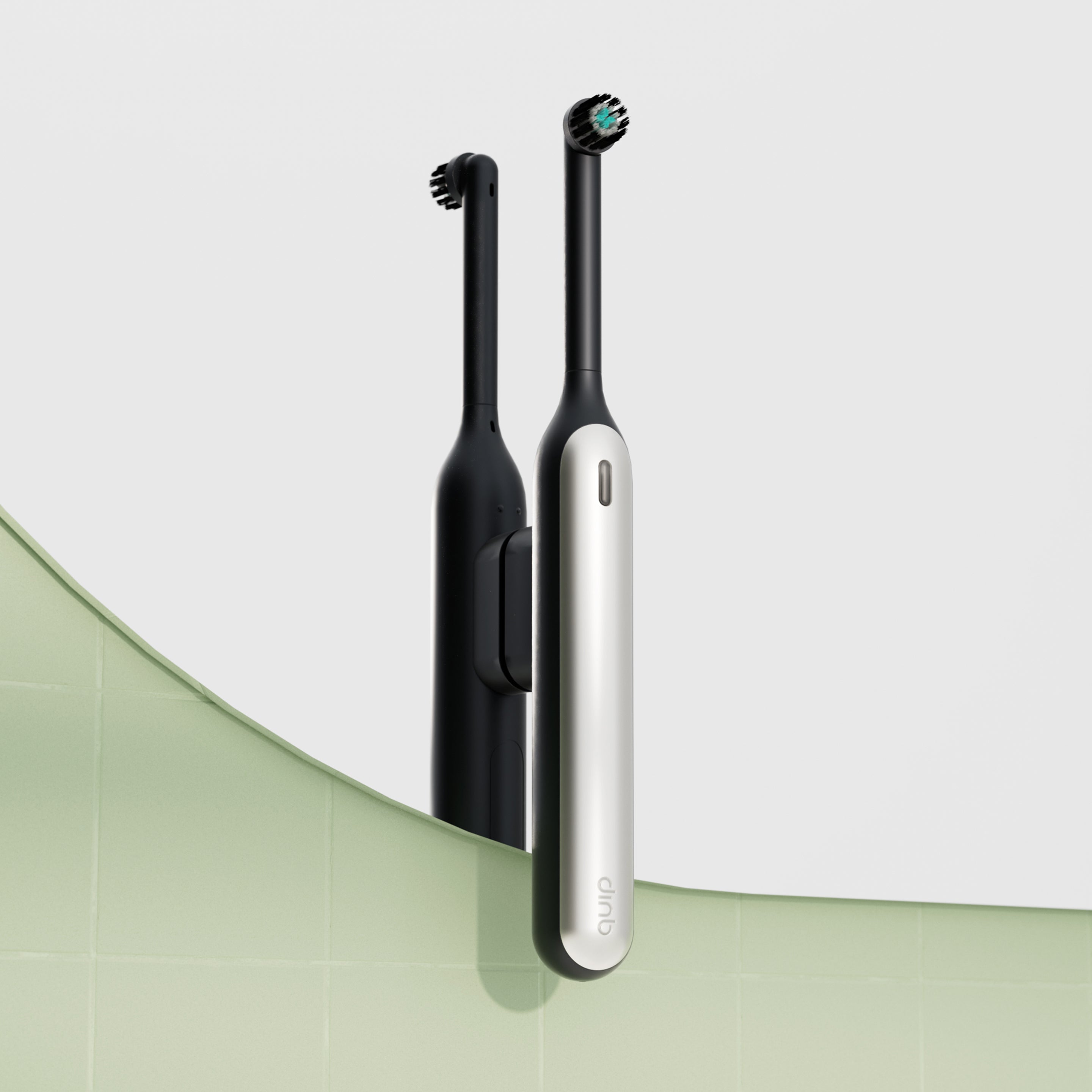 A silver and white quip Rev Oscillating Electric toothbrush is held by a black Rev Mirror Mount suctioned to a mirror, reflecting the back of the toothbrush.