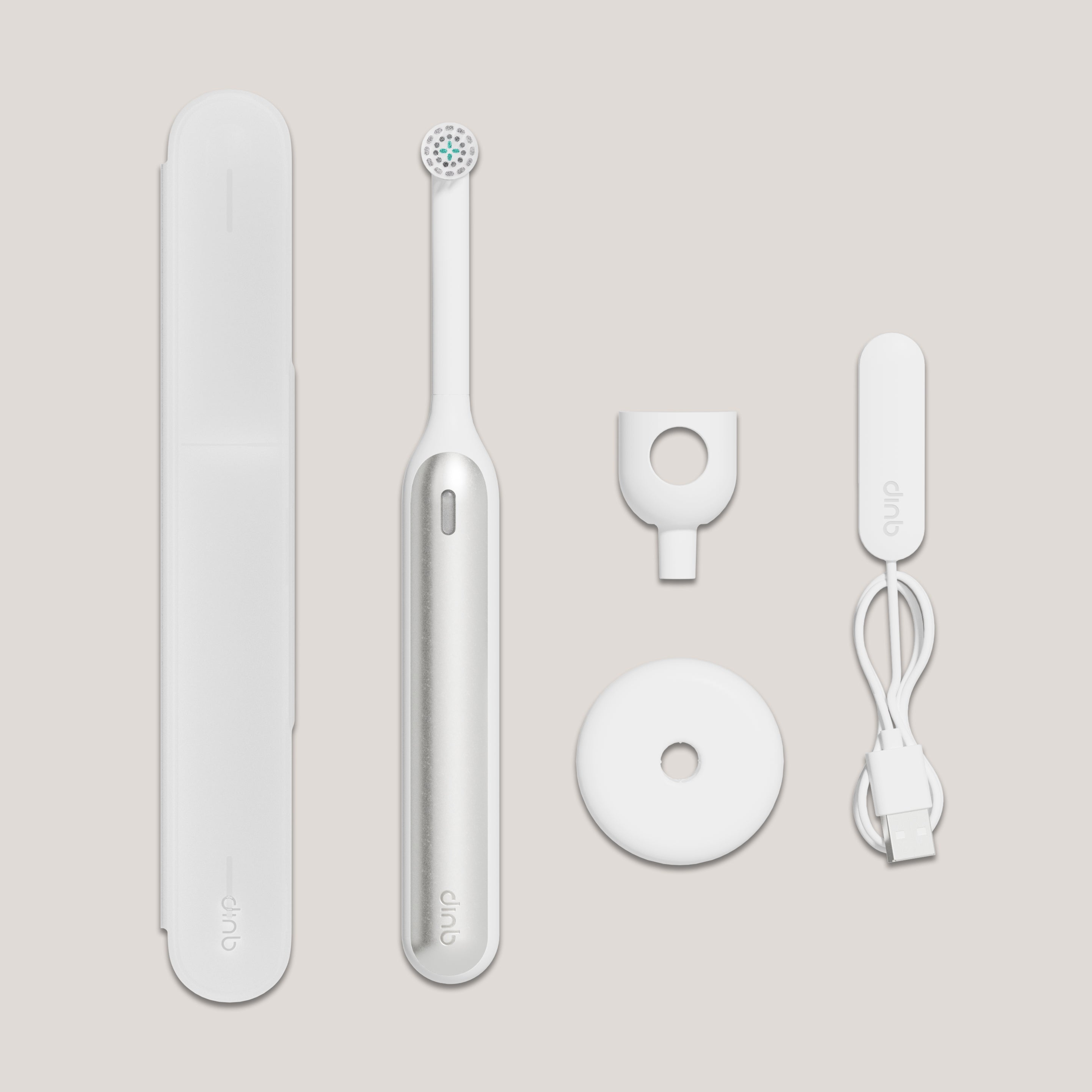 quip Rev oscillating brush purchase includes a reusable handle, replaceable brush head, countertop stand, USB charging cable, travel case.