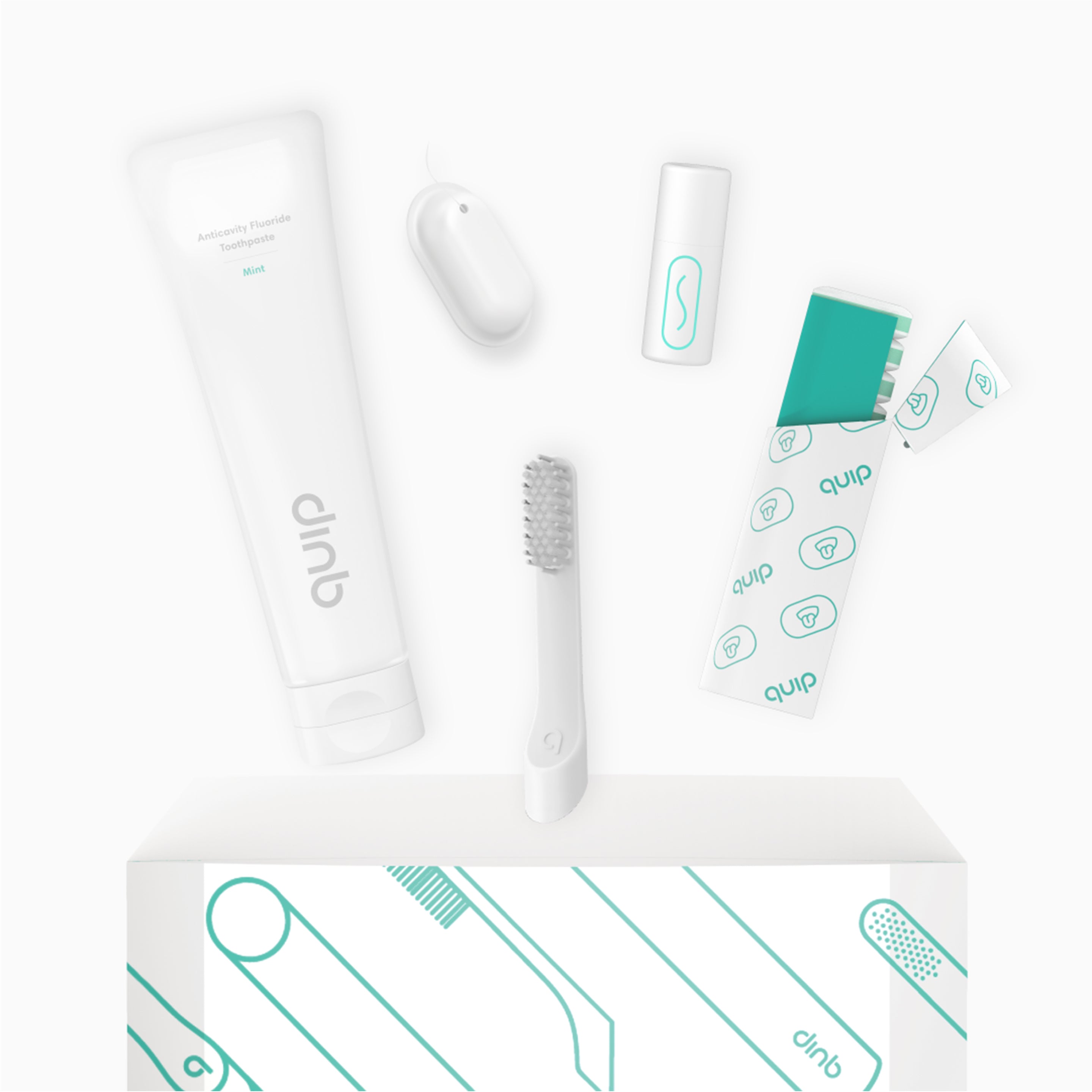 Minimalist dental care lineup featuring toothpaste, floss pick, lip balm, toothbrush head, and refill packaging.