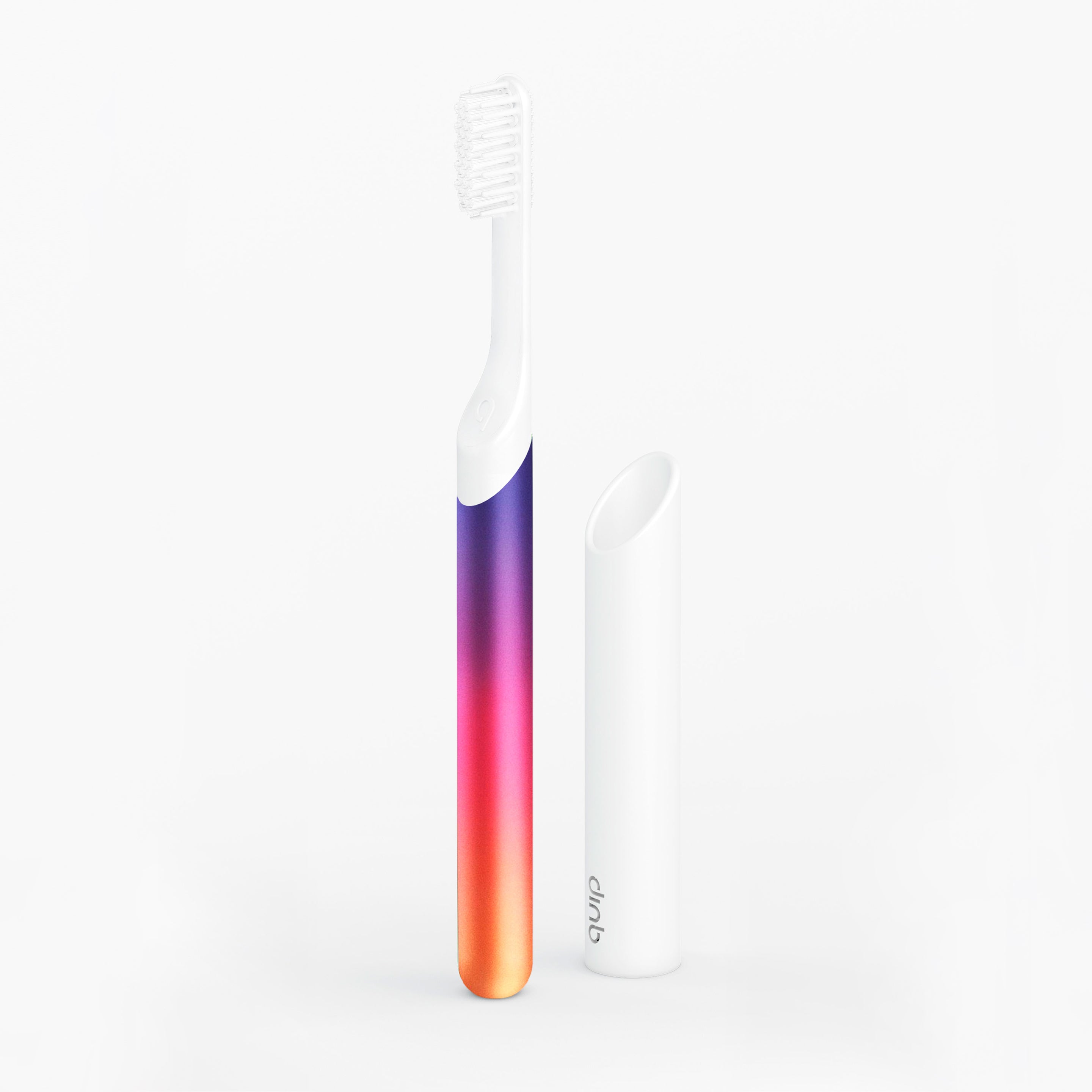An image showing a sonic toothbrush with a multicolor handle in gradient of purple, pink, orange, and yellow, alongside its travel cover which is white.