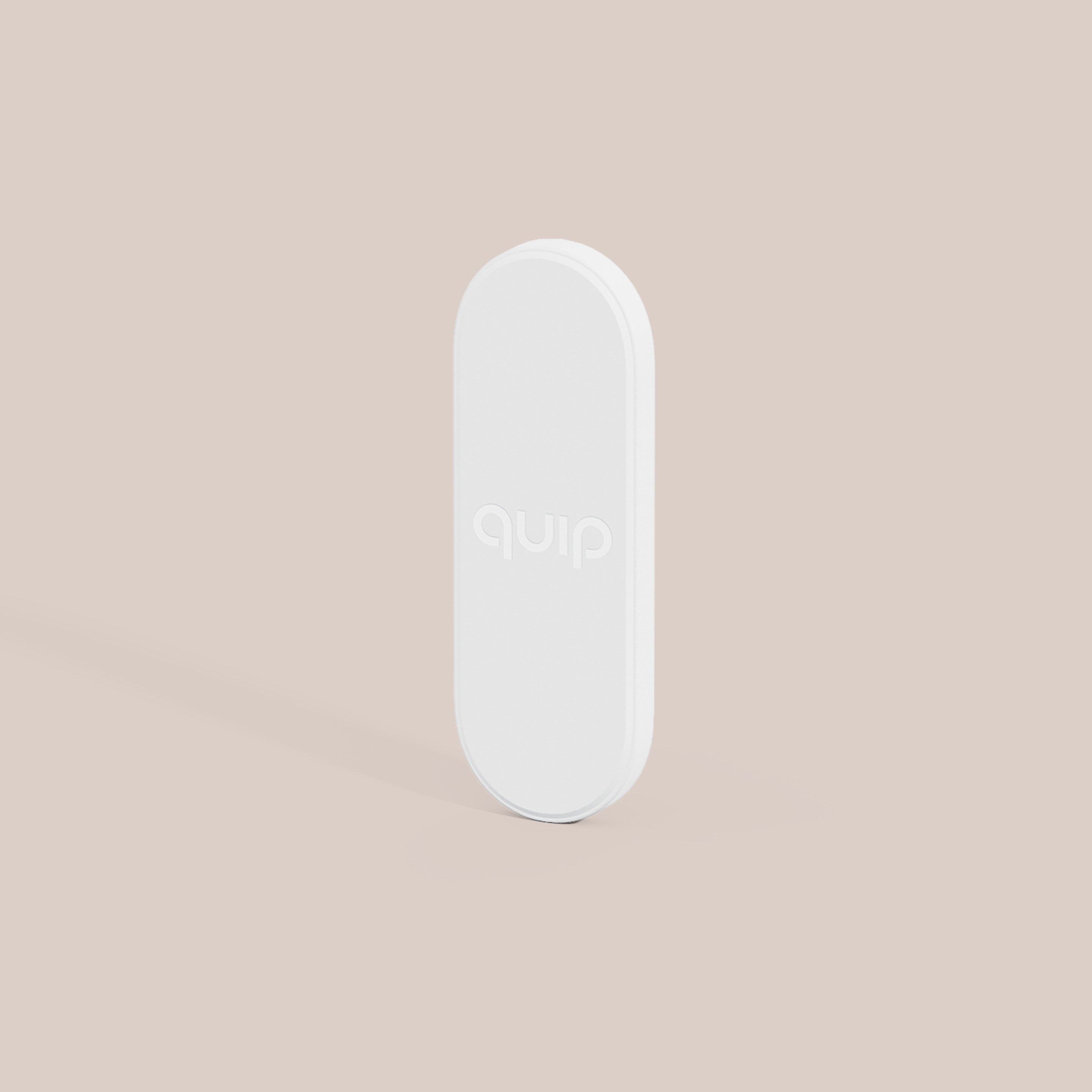 Mirror Mount in white with a sleek, rounded design and subtle “quip” logo for holding the Ultra™ toothbrush securely.