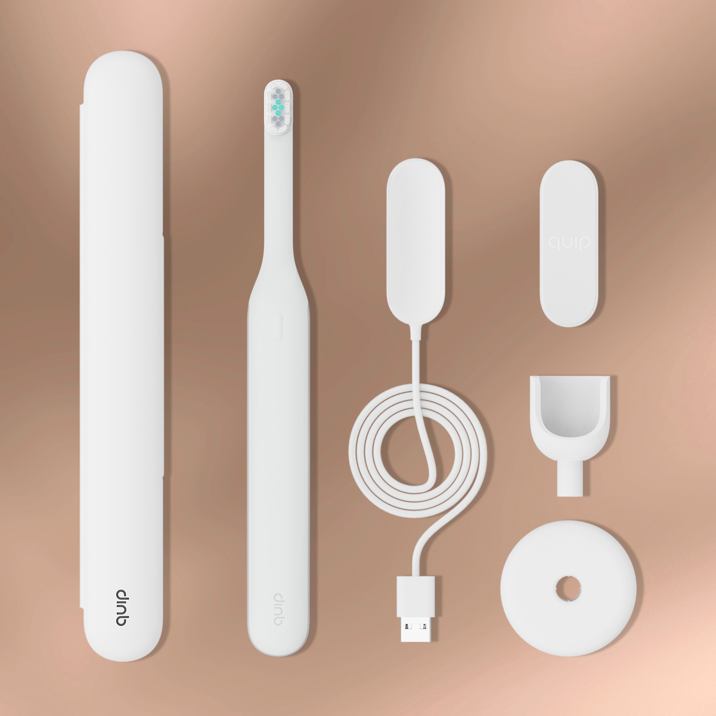 Ultra™ Smart Sonic Electric Toothbrush set in white with case, charger, cable, and stand arranged on a beige background.