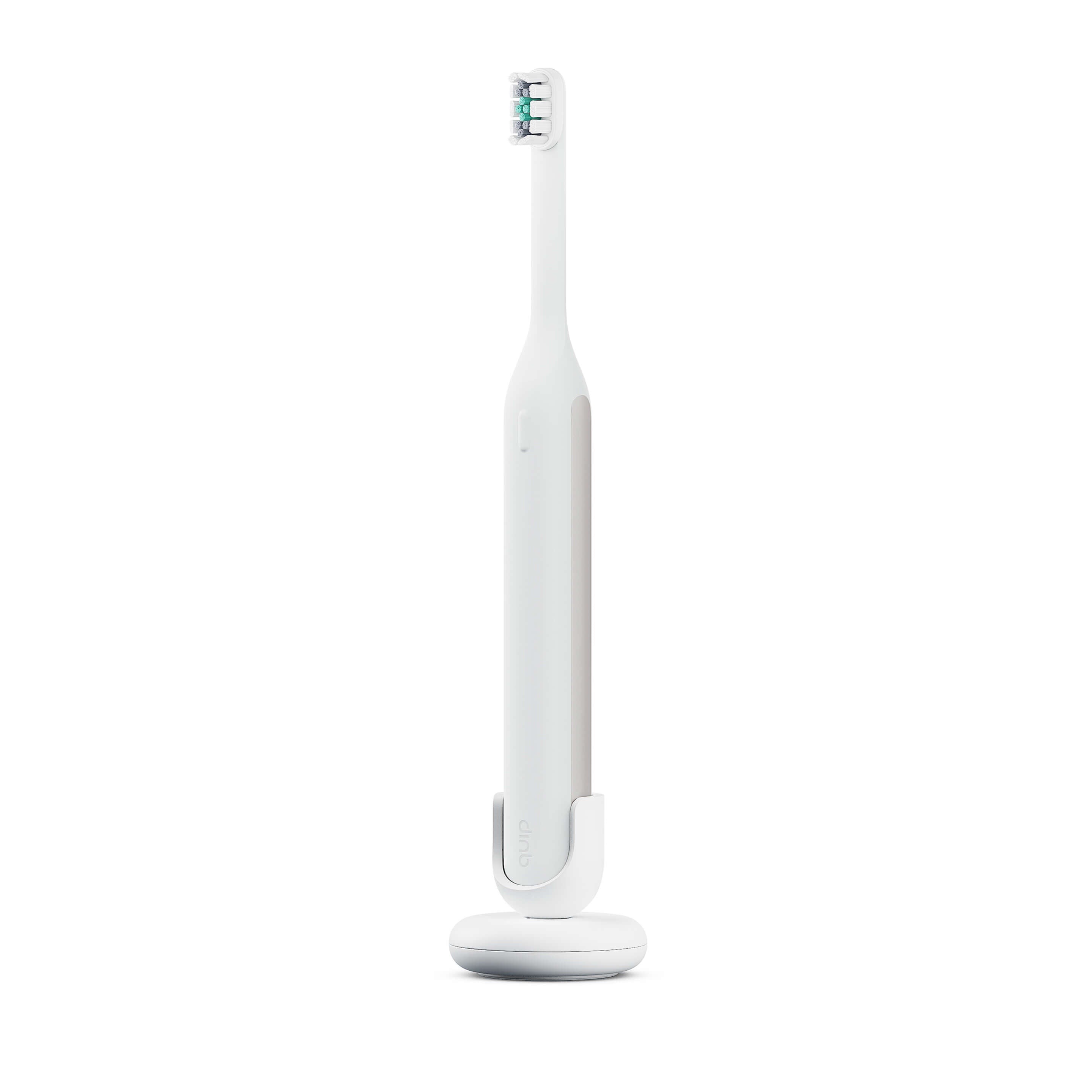 Ultra™ Next Generation Smart Sonic Electric Toothbrush in Stone color, standing upright on its Ultra Stand.