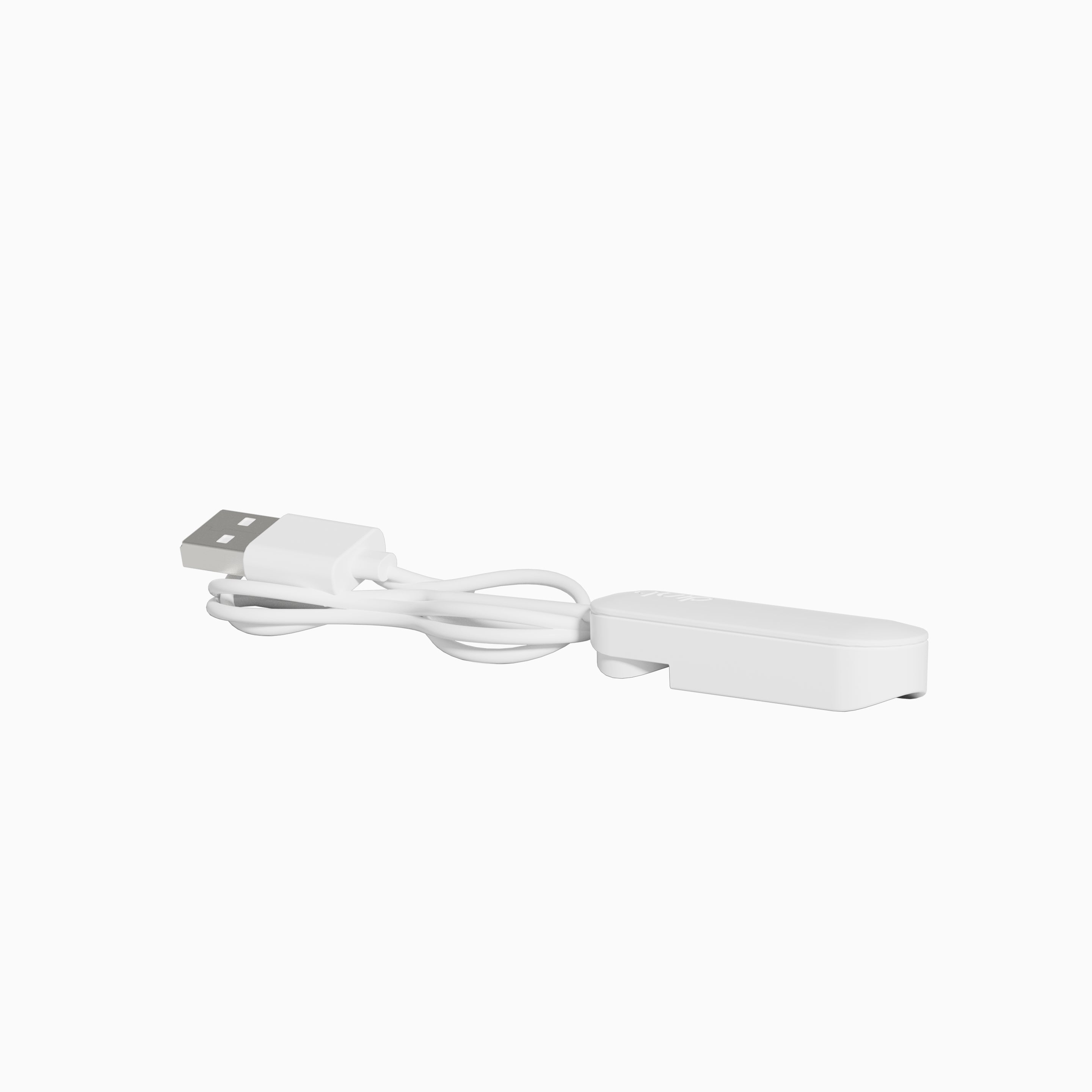 White Rev charger cable with a USB connector attached to a compact, rounded charging base, shown against a clean white background.