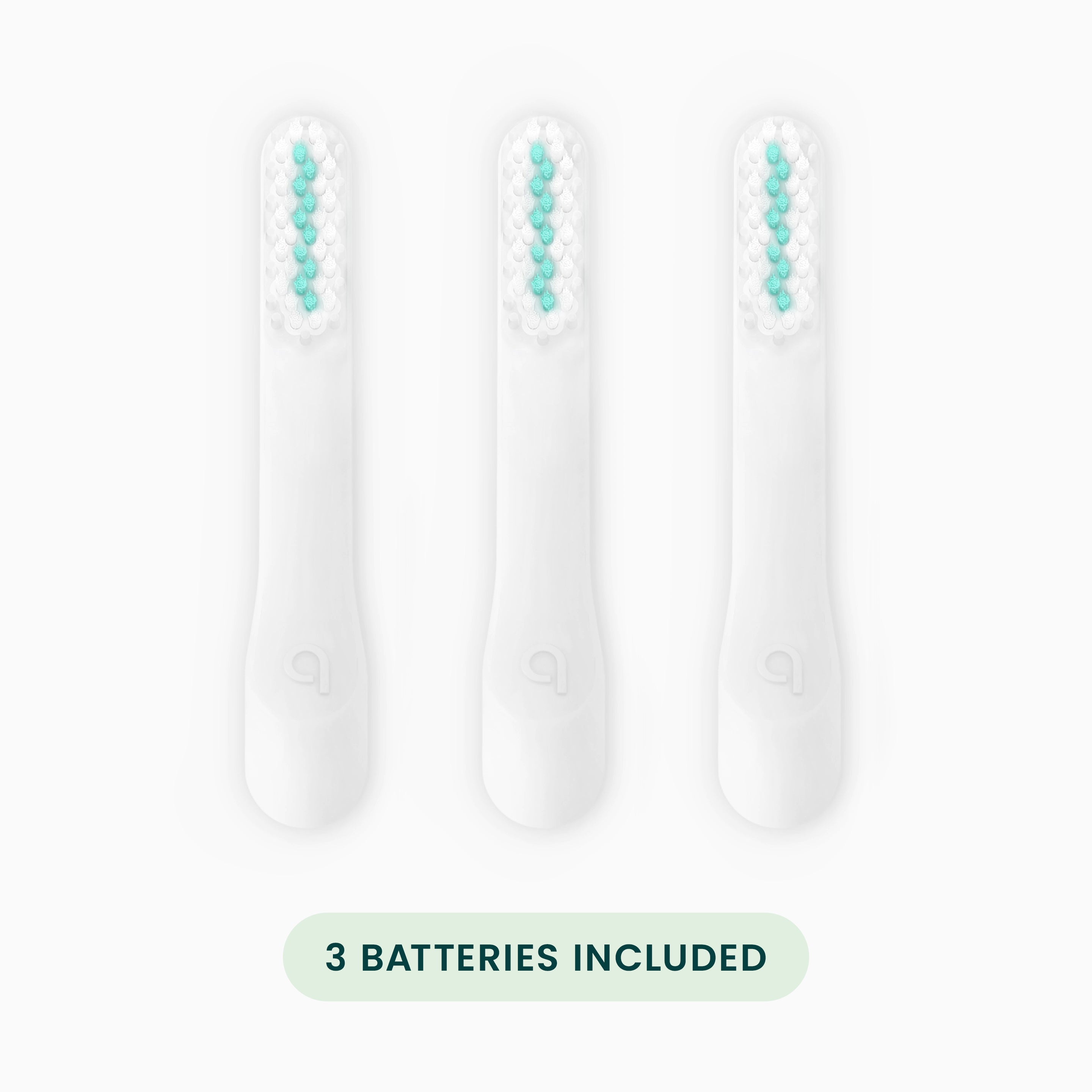 Three battery-operated toothbrush heads with a label indicating '3 batteries included' on a light gray background.