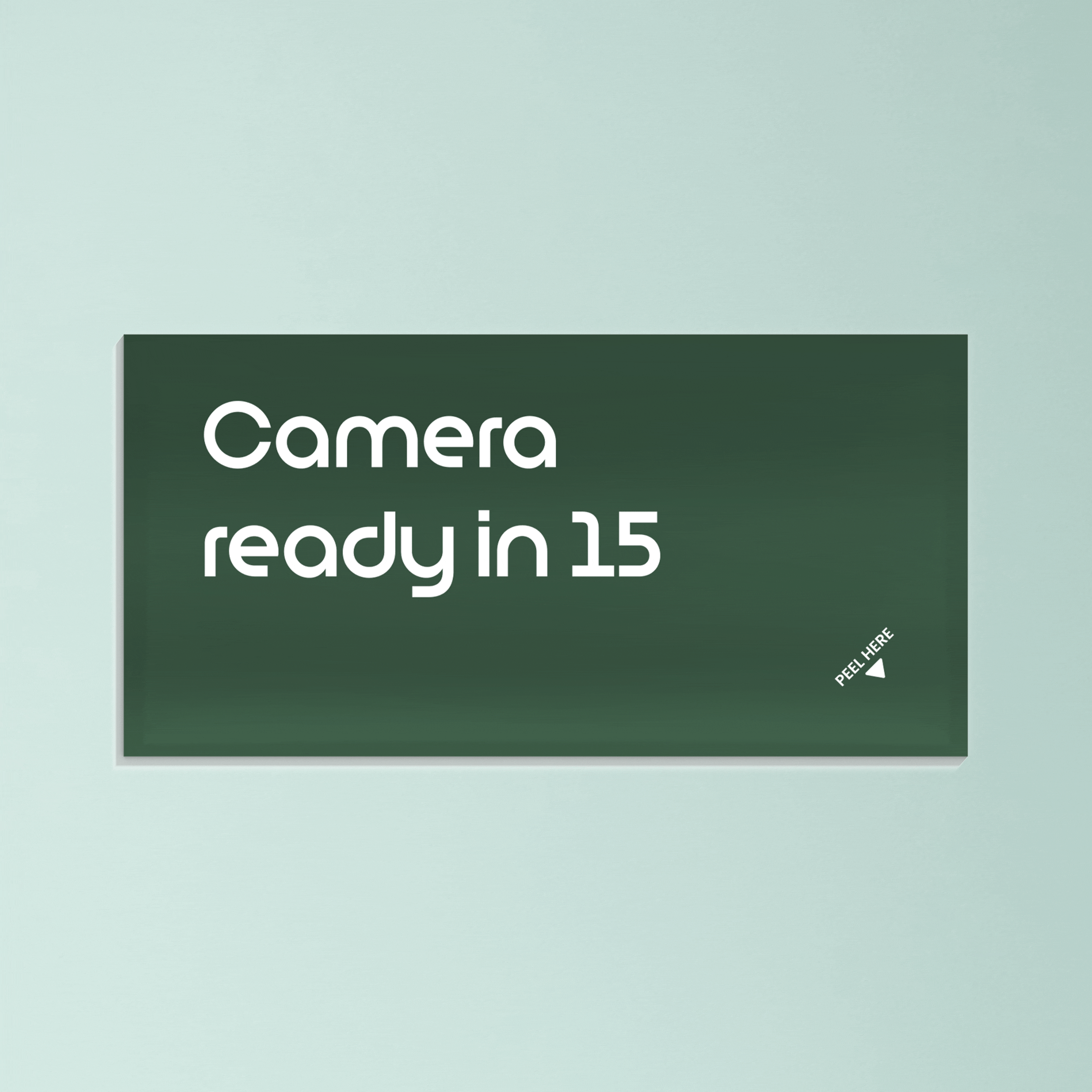 Green card with the text ‘Camera ready in 15’ against a light mint background.