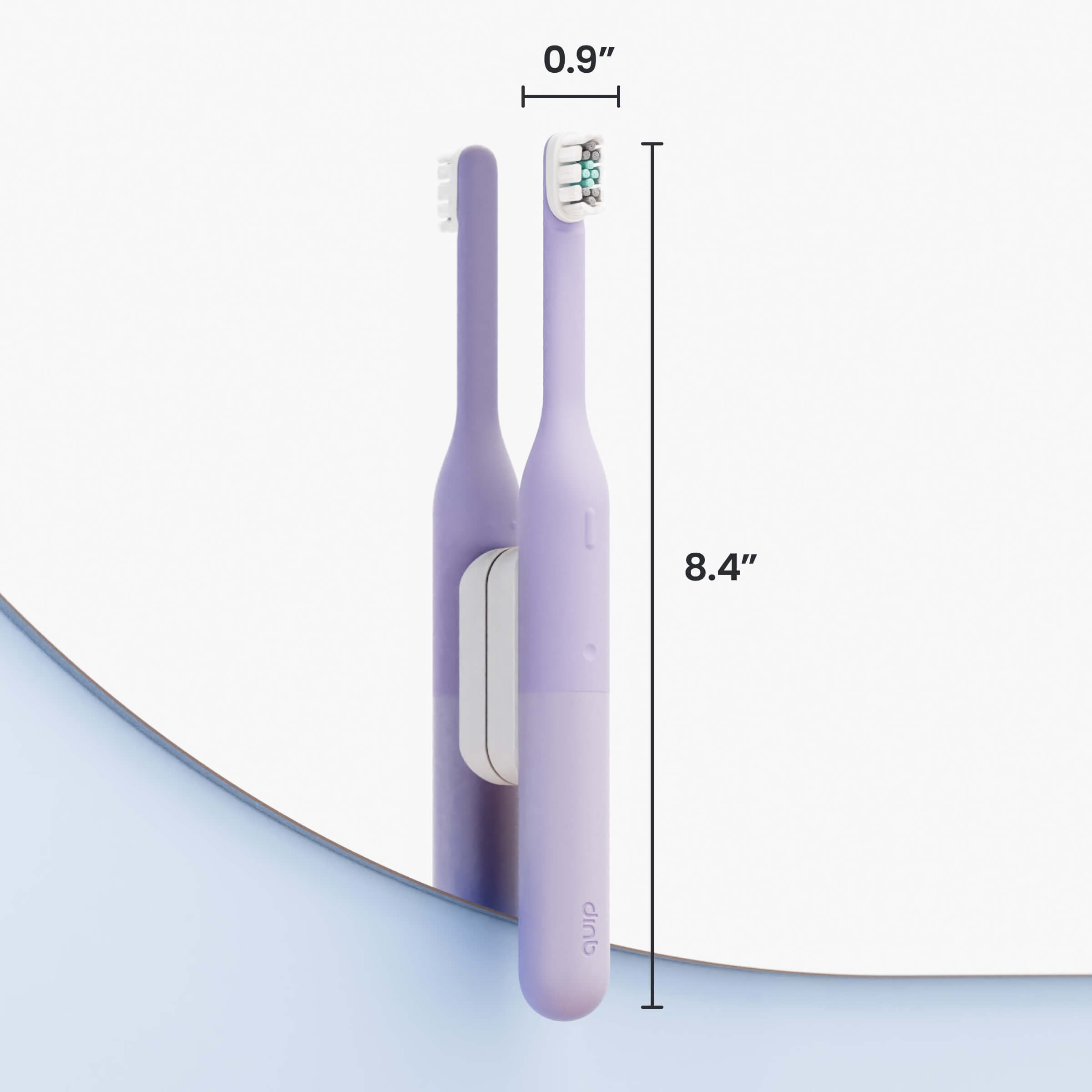 Two purple electric toothbrushes with measurements on a white background