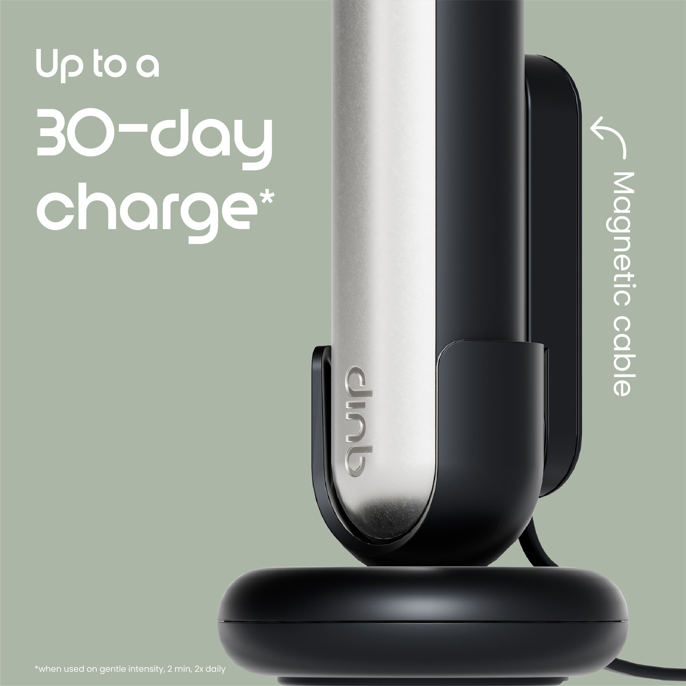 Silver and black electronic device with 'quip' branding on a light green background, highlighting magnetic cable feature.