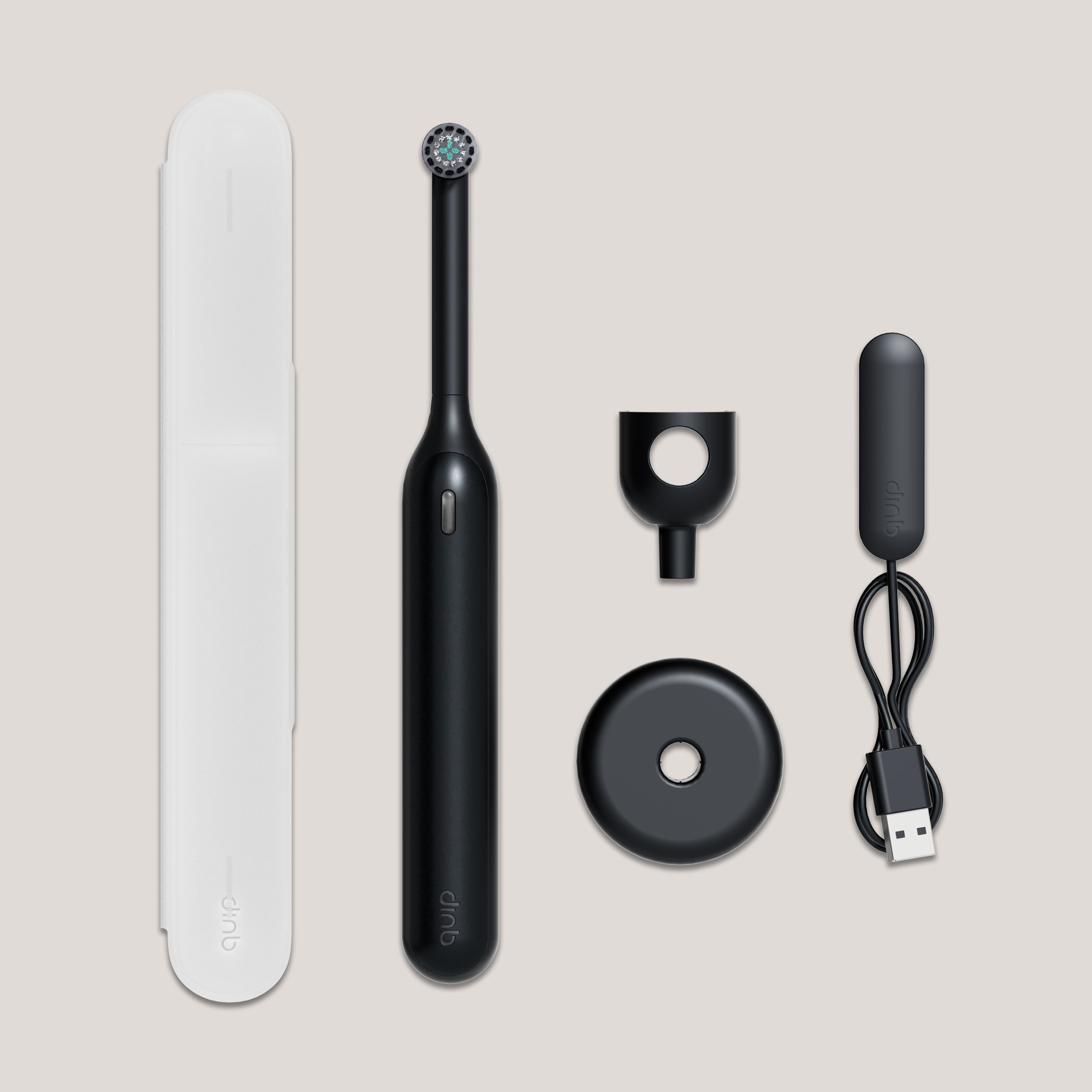 quip Rev oscillating brush purchase includes a reusable handle, replaceable brush head, countertop stand, USB charging cable, travel case.