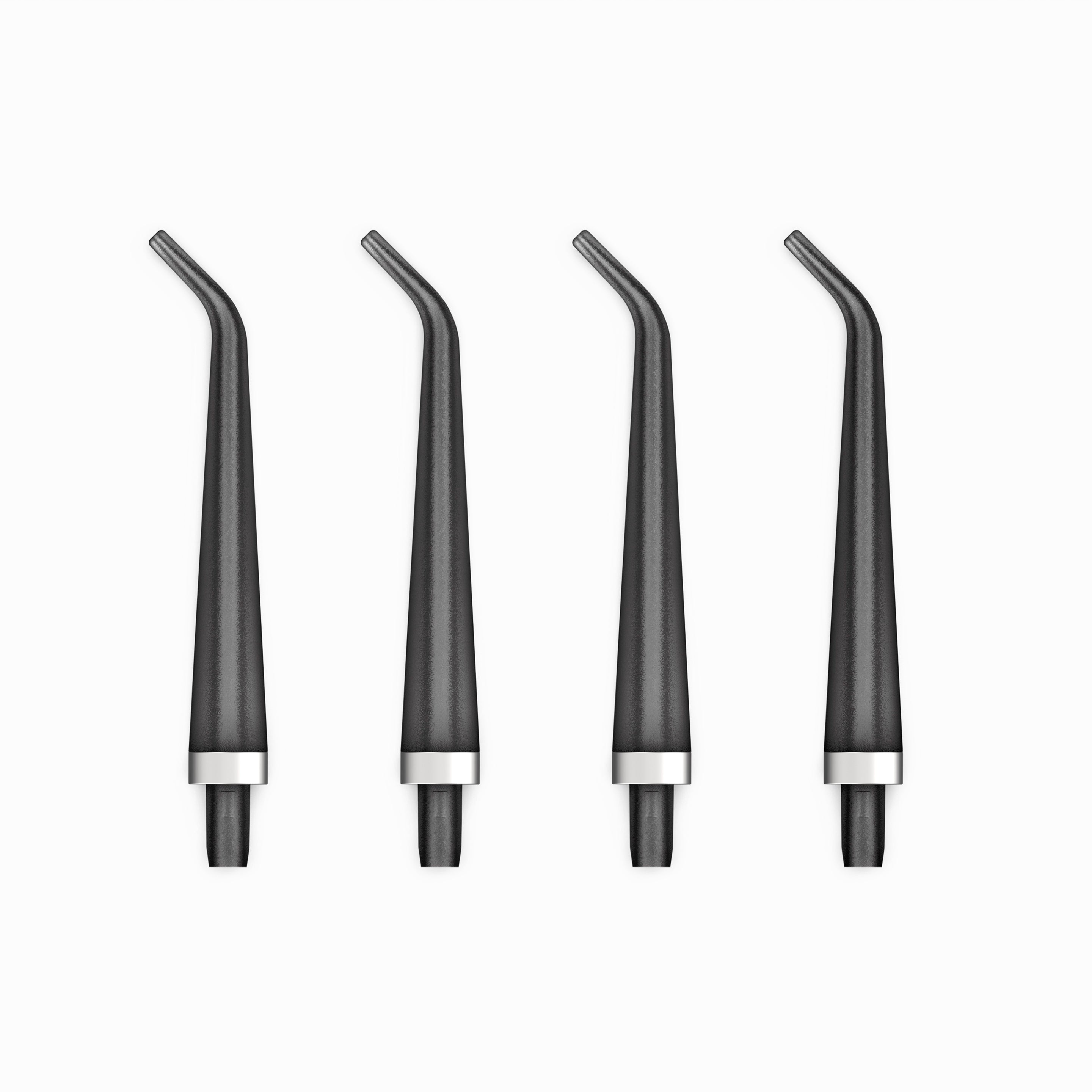 Four black and silver dental water flosser nozzles on a white background