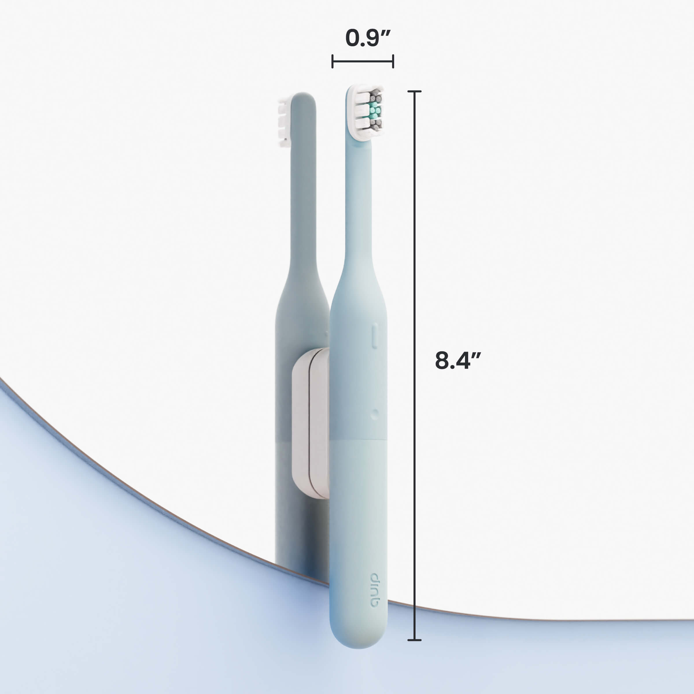 Two electric toothbrushes with measurements on a light gray background
