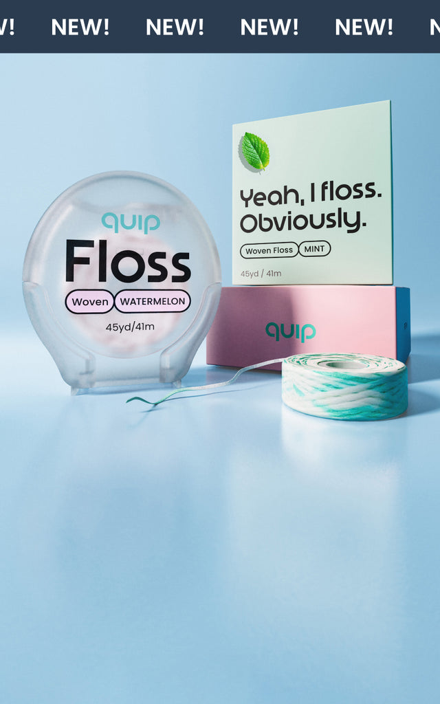 Quip Floss dental floss products displayed on a light blue gradient background, including a clear round container, a pink box, a white box with green text, and a mint-green wrapped floss tube.