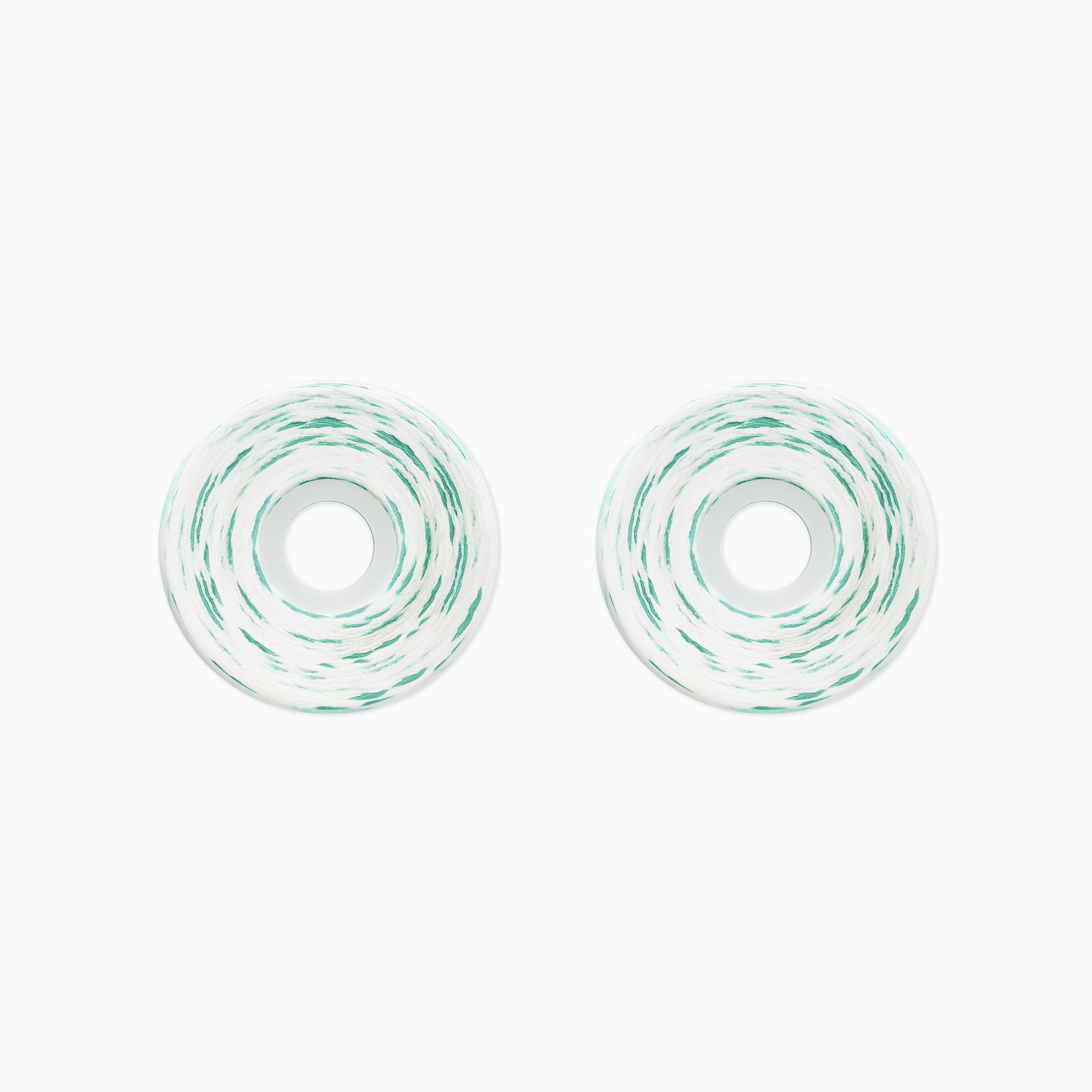 Silver hoop earrings with pink and clear gemstones on a white background